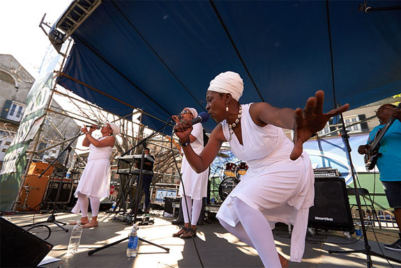 Sula Janet Evans, left, performs live at French Quarter Fest with Zion Trinity at the Old U.S. Mint.